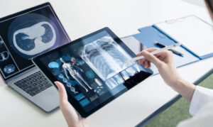 Doctor Analysing digital X-ray