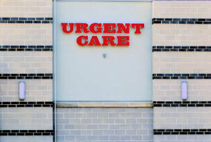 urgent care sign on a building